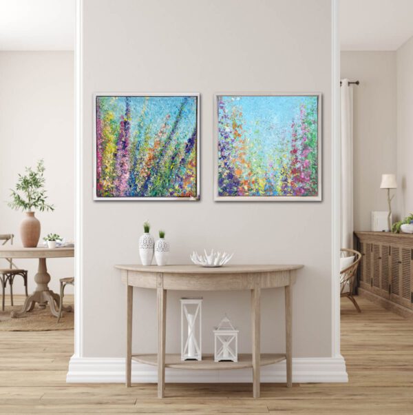Two Field of wild flowers, in a 20 x 20 x 3 inches in a custom white-washed oak floater frame paintings in a living room.