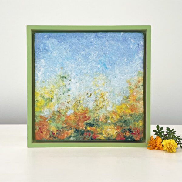 Burst of marigolds, 9 x 9 x 1 inches, green painted maple frame.