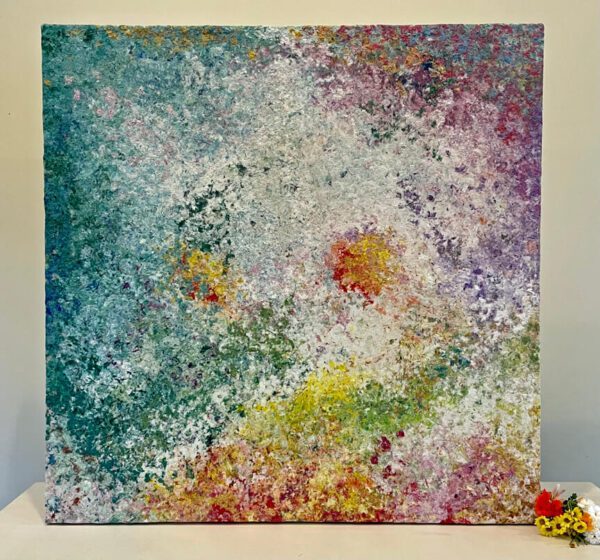 An abstract painting with a flower in the middle.