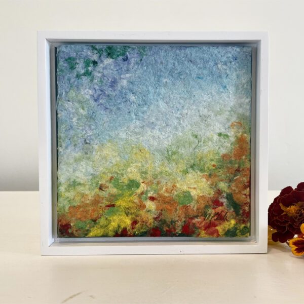 Marigolds in the Wind, 7 x 7 x 1 inches, white floater frame.