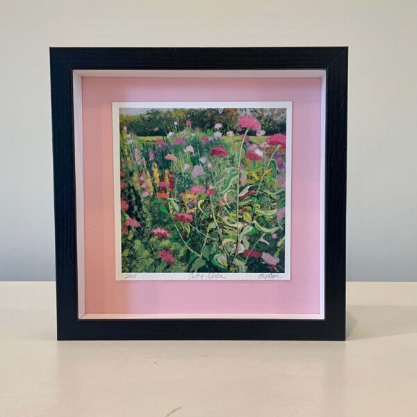 Pink Cutting Garden, 9 x 9 x 2 inches, light pink mat, white lining, black shadow box frame.