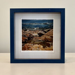 Rocks and Water as metaphor for life's journey, white mat, blue shadow box frame, 9 x 9 x 2 inches