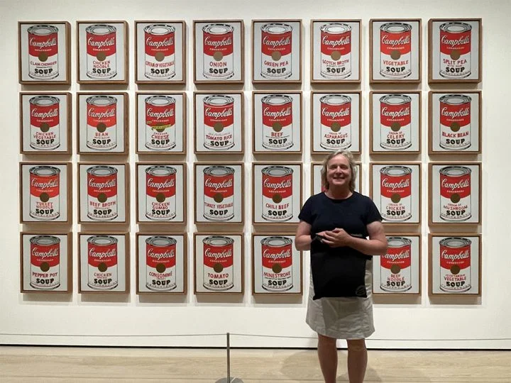 228, 237. A woman standing on the deck of a tall ship.