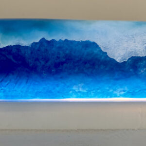 SOLD. The light within, 12.5L x 4.5W x 4.5H, epoxy and abaca sculpture with LED light.